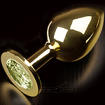 Фото 1: Большая анальная пробка со стразом, золотая с салатовым кристаллом