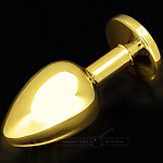 Фото 2: Большая анальная пробка со стразом, золотая с салатовым кристаллом